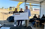 Grainger officials present $20,000 to local school